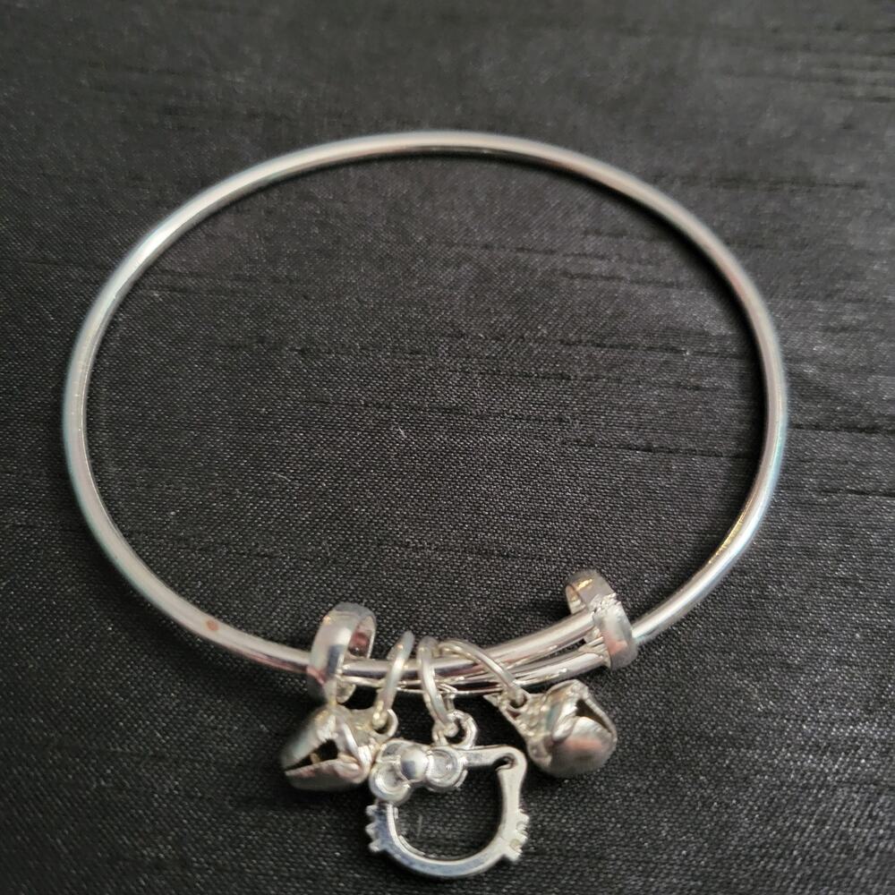Hello Kitty silver tone charm bracelet with little bells